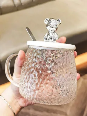 Glass cup with spoon